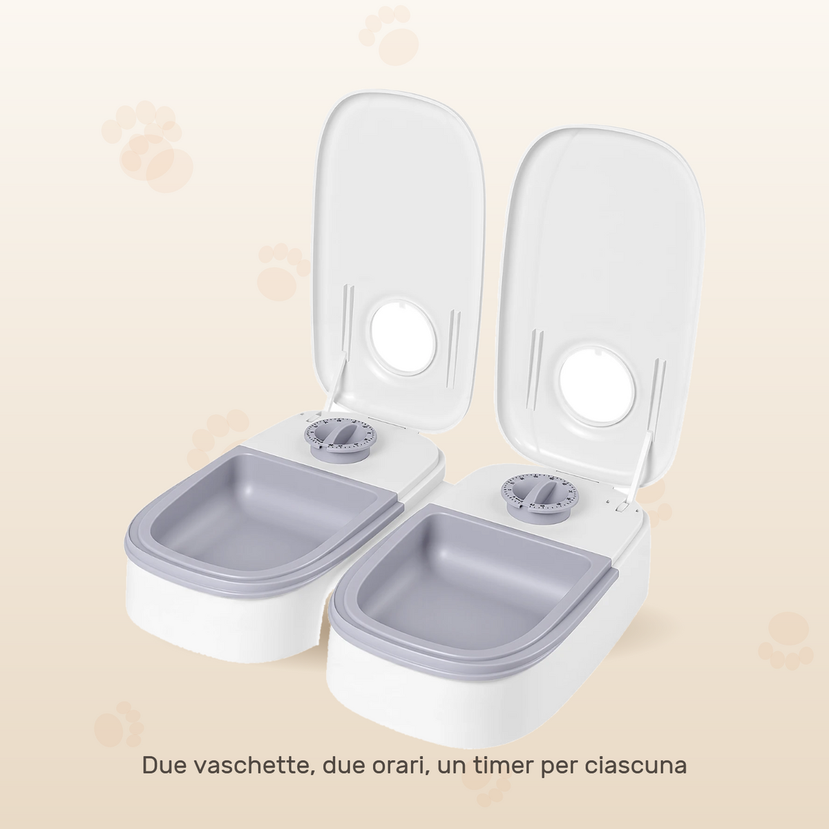Le due vaschette del distributore automatico, con coperchio aperto e manopola del timer